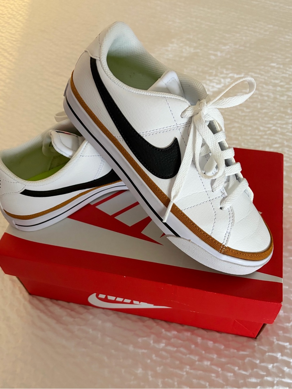 Nike Women’s White Sneakers with Black Swoosh and Brown Trim - Picture 3 of 9